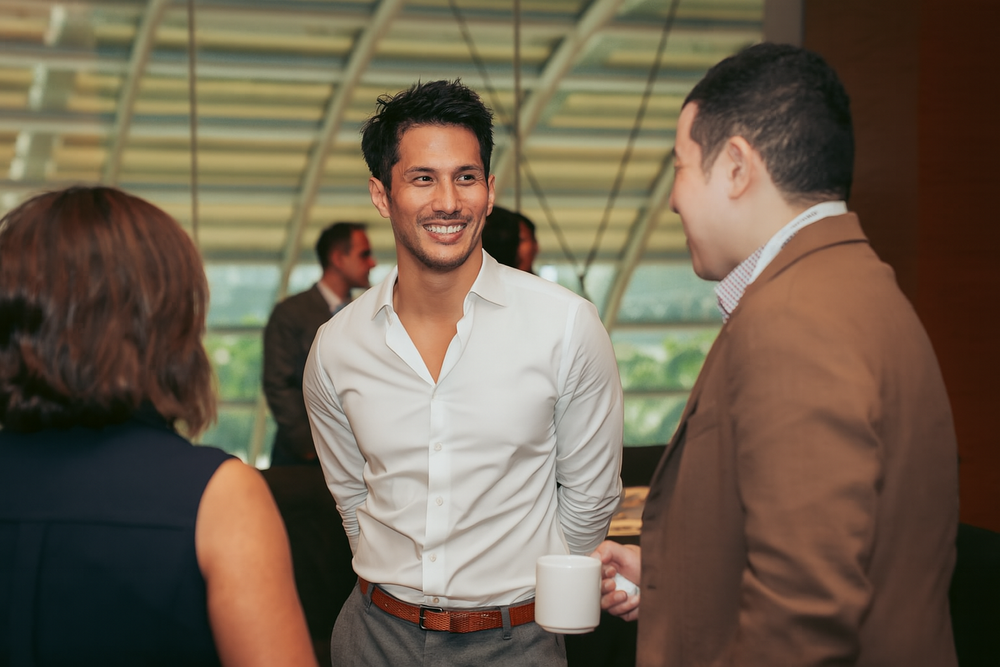 Christoph Jourdan in conversation at an event